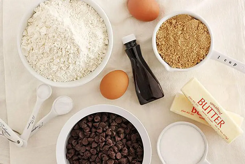 Image of a baking ingredients with flour, sugar, eggs, and butter